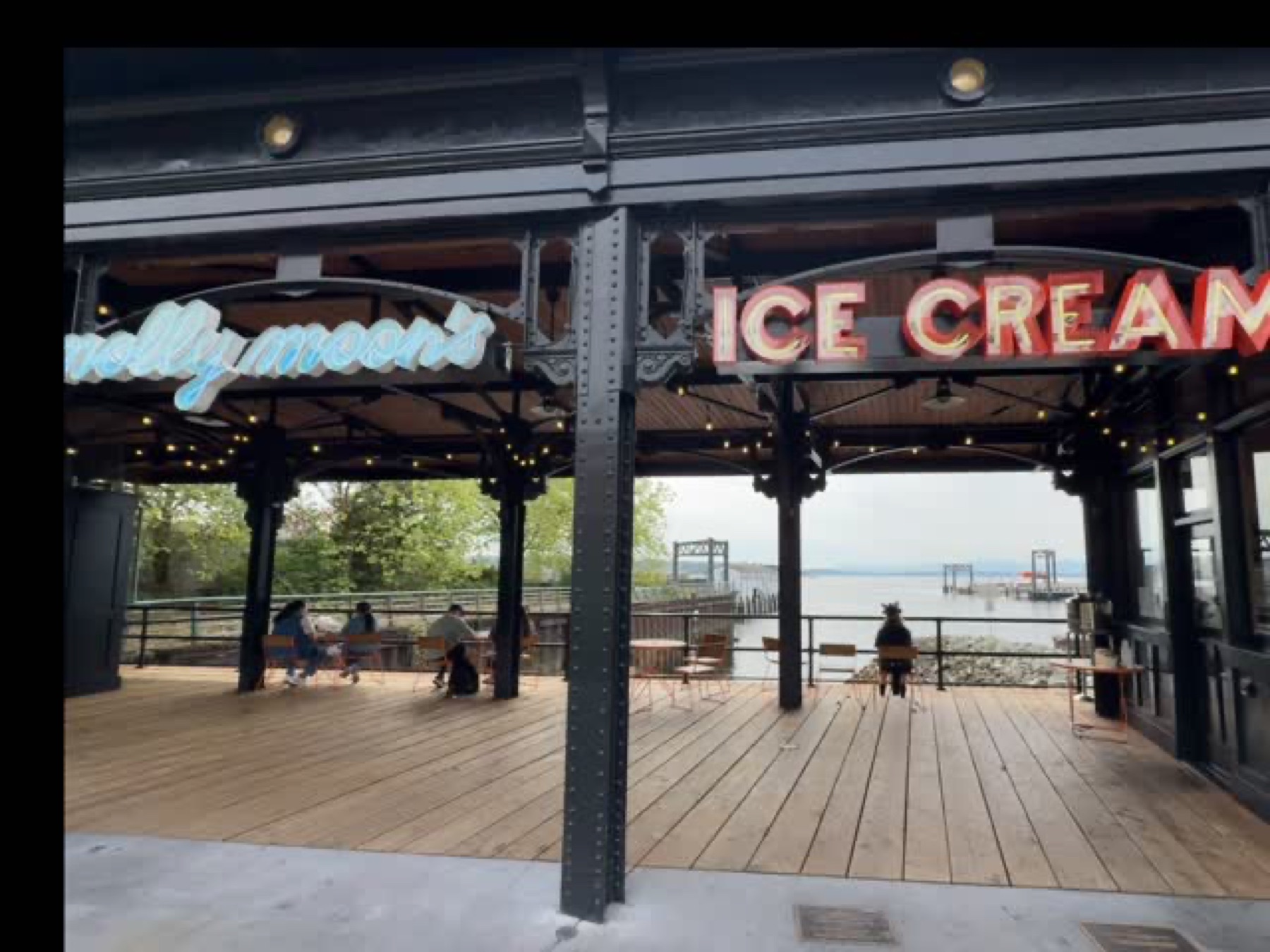 Seattle pier and neon in evening light
